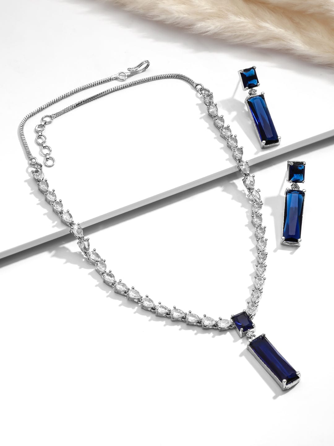 Stunning Rhodium-Plated Pendant Set with Sparkling CZ Blue Stones