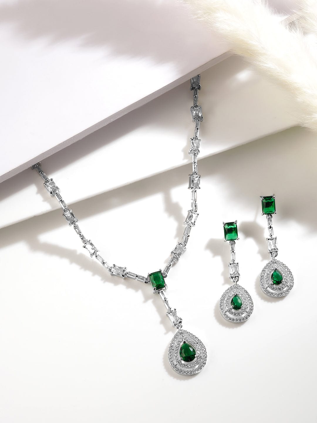 Stunning Rhodium Plated Emerald Teardrop Pendant Necklace Adorned with AD & Sparkling Cubic Zirconia Studs